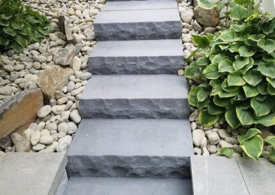 hardscaped exterior stone stairs