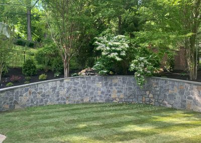 Hardscaped Stone Wall in backyard